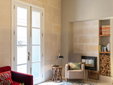 Hotel Boutique Can Sastre - Ciutadella, Menorca - Reading corner by the fireplace - SecretPlaces
