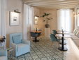 Hotel Boutique Can Sastre - Ciutadella, Menorca - Breakfast room with patterned floor tiles - SecretPlaces