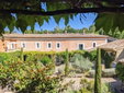 Elegant Accommodation: Le Mas des Oules in Saint-Victor-des-Oules offers a guest house with a sun terrace, garden, tennis court, 