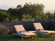 Sun loungers in the garden at La Saracina, Tuscany - Secretplaces