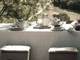Breakfast with a garden view at La Saracina, Tuscany - Secretplaces