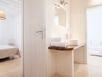 Suite Interior with Bedroom and Bathroom View – Baba Houlakia – Mykonos, Cyclades – Secretplaces